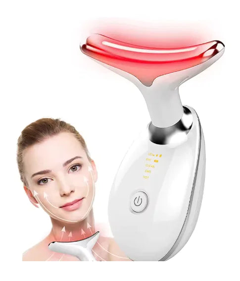 Facial massager with red light on a white background