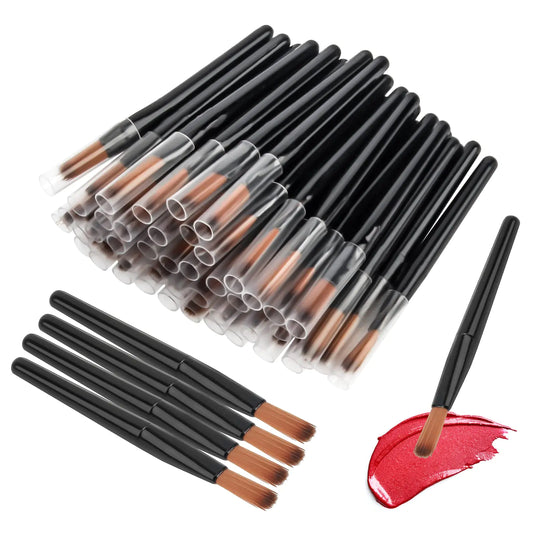 Set of makeup brushes with black handles and brown bristles, some in clear packaging, on a white background.
