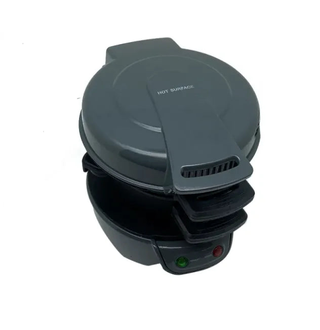 Black sandwich maker with open lid on a white background