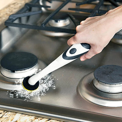 Person cleaning a gas stove with a scrubber