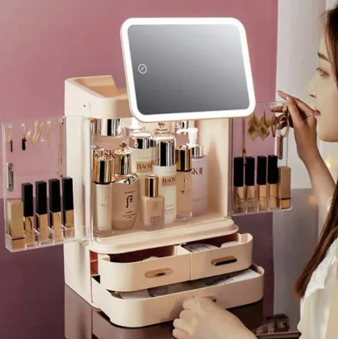 Makeup organizer with a mirror and various cosmetic products on a pink background
