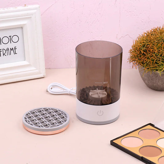 Cosmetic product with a transparent container and grid lid on a pink surface.