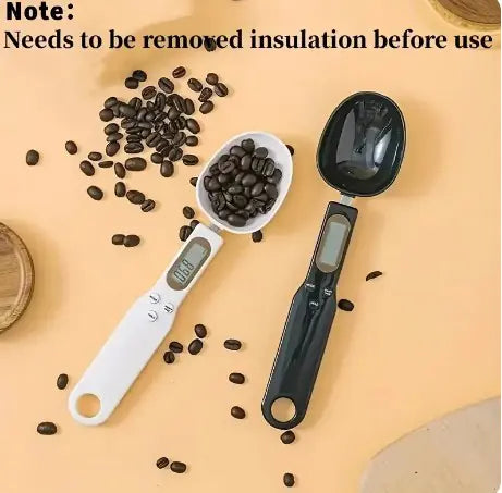 Two digital measuring spoons with coffee beans on a beige background