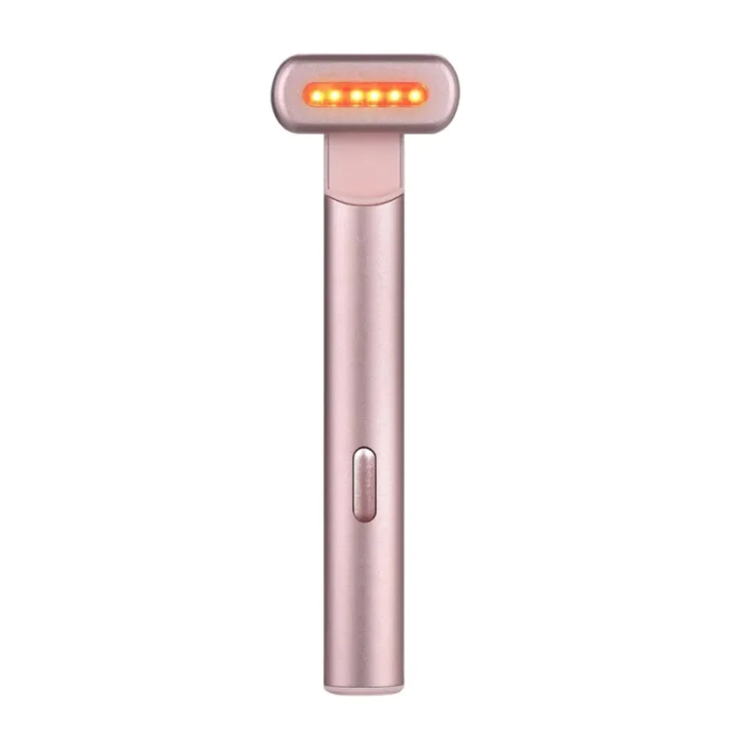 Rose gold handheld device with LED lights on a white background