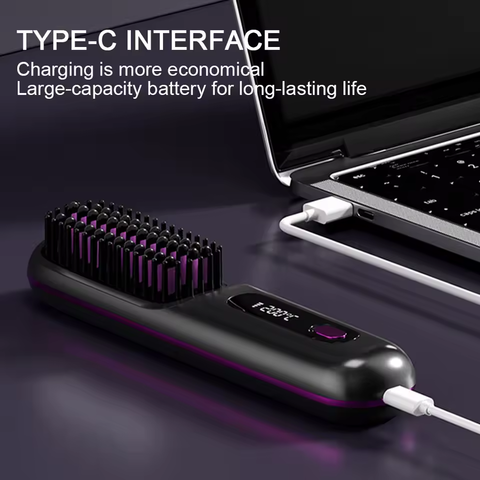 Black hairbrush with digital display and charging cable, connected to a laptop on a dark surface.