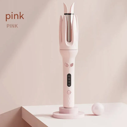 Pink hair straightener on a light pink background with 'pink' text.