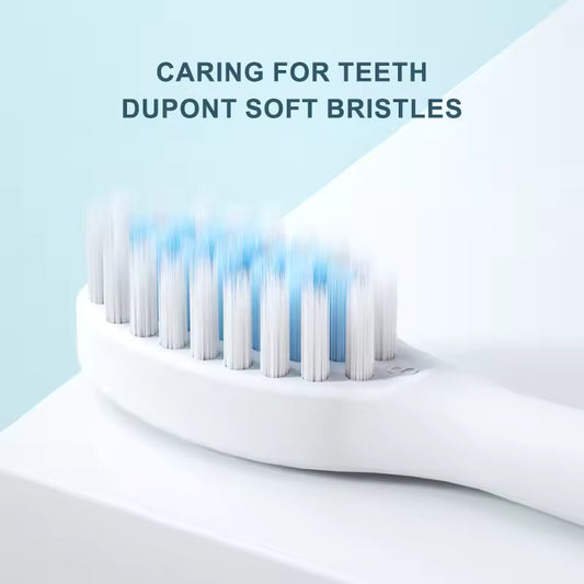 Close-up of a toothbrush with Dupont soft bristles on a light blue background
