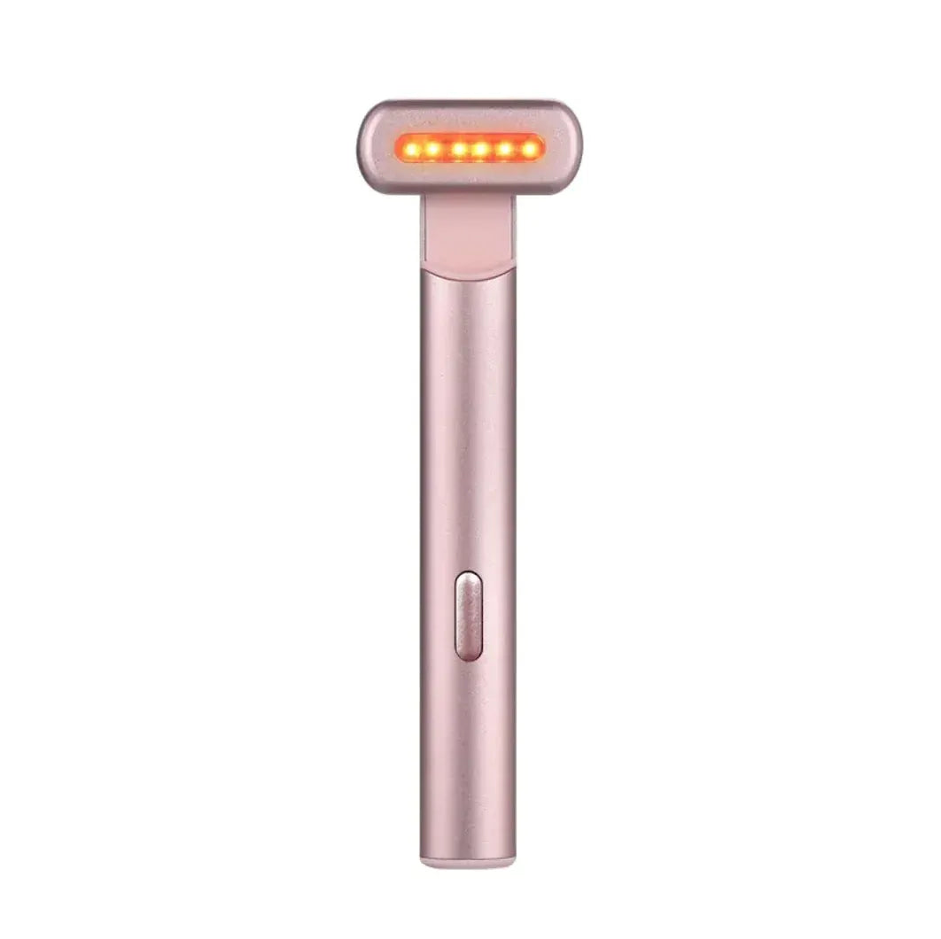 Rose gold handheld device with LED lights on a white background