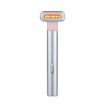 Handheld electronic device with a silver body and pink roller on a white background