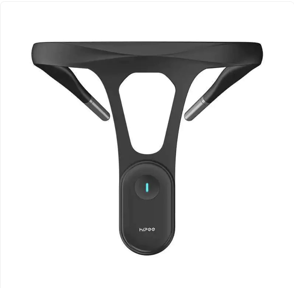 Black electronic device with a circular button on a white background