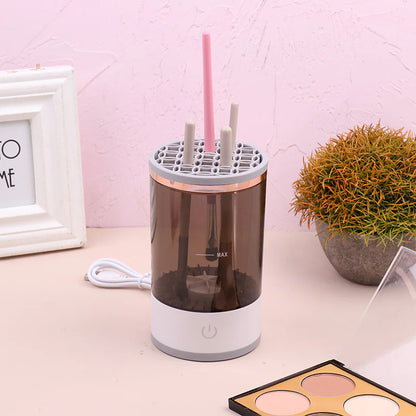 Umbrella dryer on a table with a pink wall and decorative items in the background