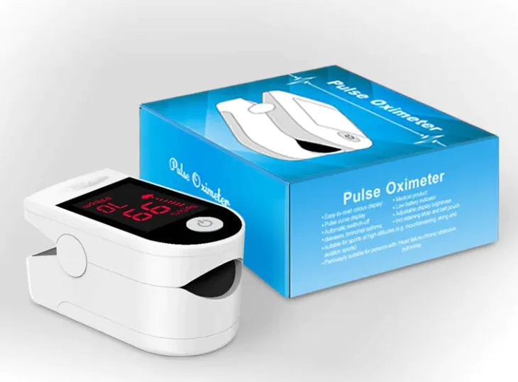Pulse oximeter with its packaging on a white background