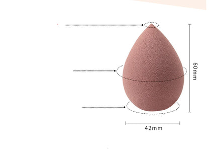 Measurement chart of a pink makeup sponge with dimensions labeled.